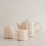 Pink Japanese porcelain tea set by Marumitsu Pottery