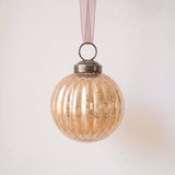 2 inch champagne gold ribbed glass Christmas bauble with a bronze cap and ribbon hanger, made in India