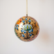 2 inch gold papier-mache Christmas ornament hand-painted with a Kashmiri floral motif