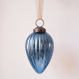 2 inch deep navy pressed glass pinecone ornament with a bronze cap and ribbon hanger, made in India