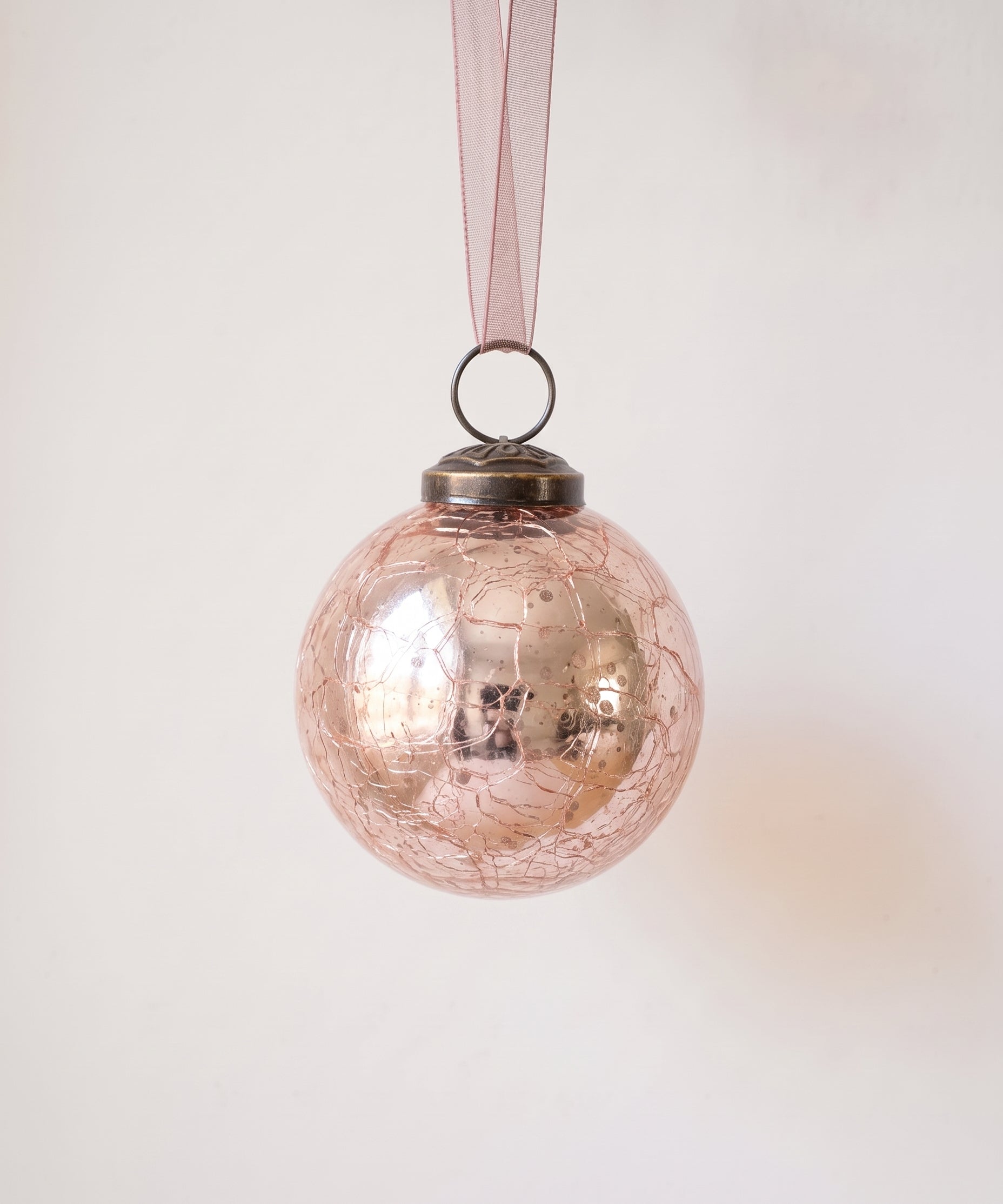 2 inch rose crackle glass Christmas bauble with a bronze cap and ribbon hanger, made in India
