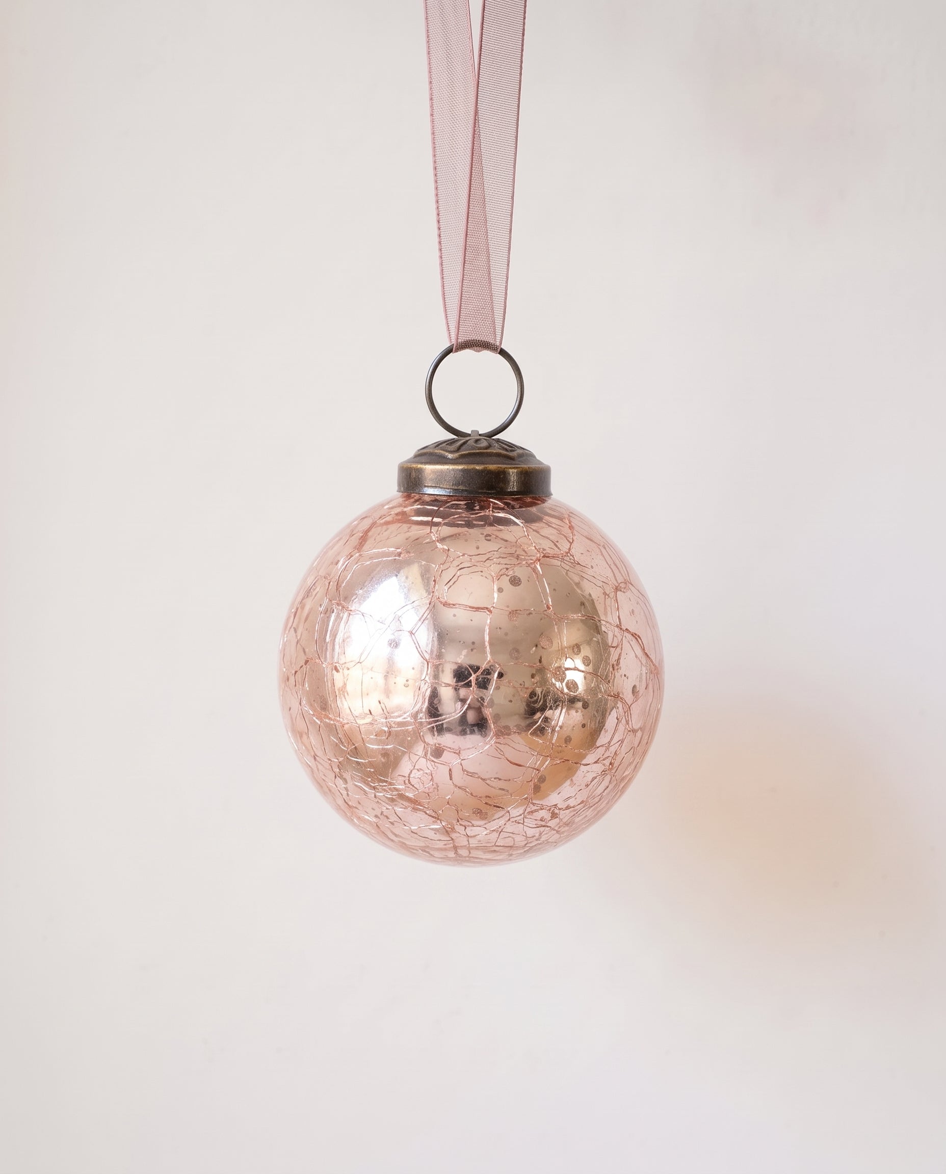 2 inch rose crackle glass Christmas bauble with a bronze cap and ribbon hanger, made in India