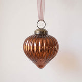 2 inch russet ribbed glass lantern ornament with a bronze cap and ribbon hanger, made in India