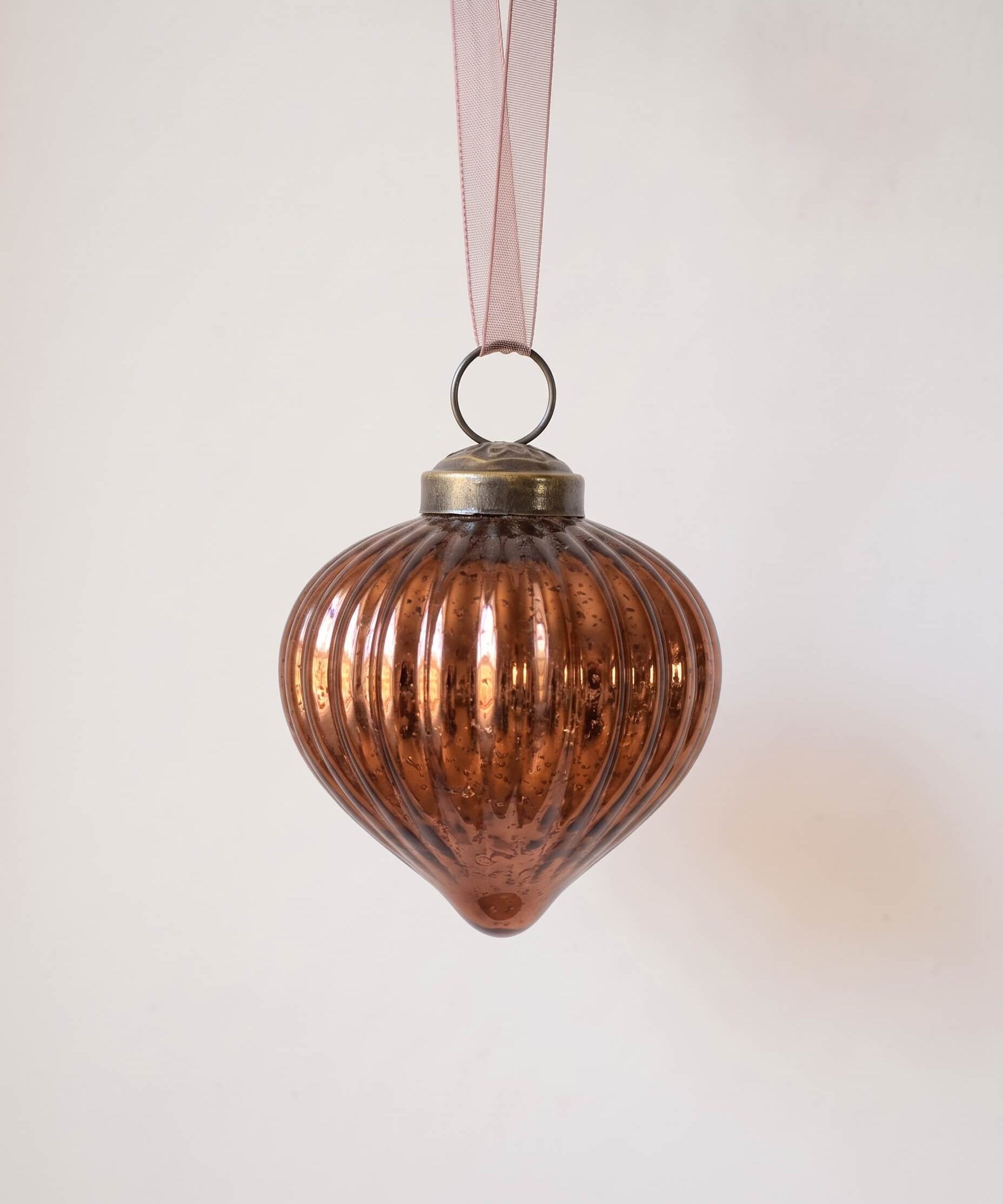 2 inch russet ribbed glass lantern ornament with a bronze cap and ribbon hanger, made in India