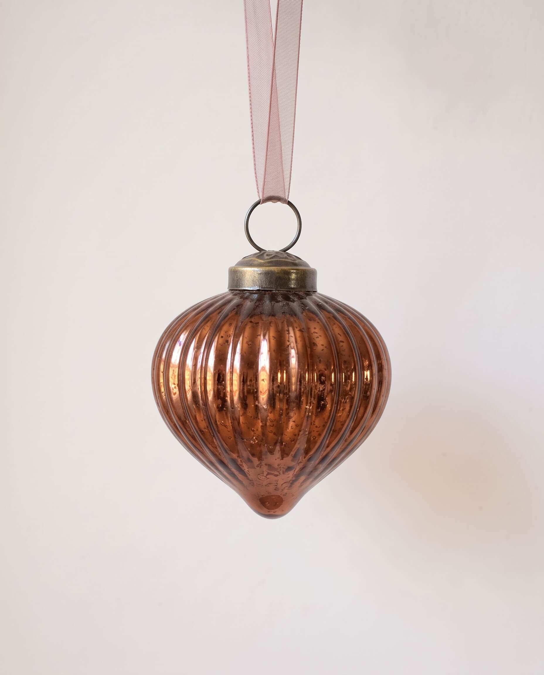 2 inch russet ribbed glass lantern ornament with a bronze cap and ribbon hanger, made in India