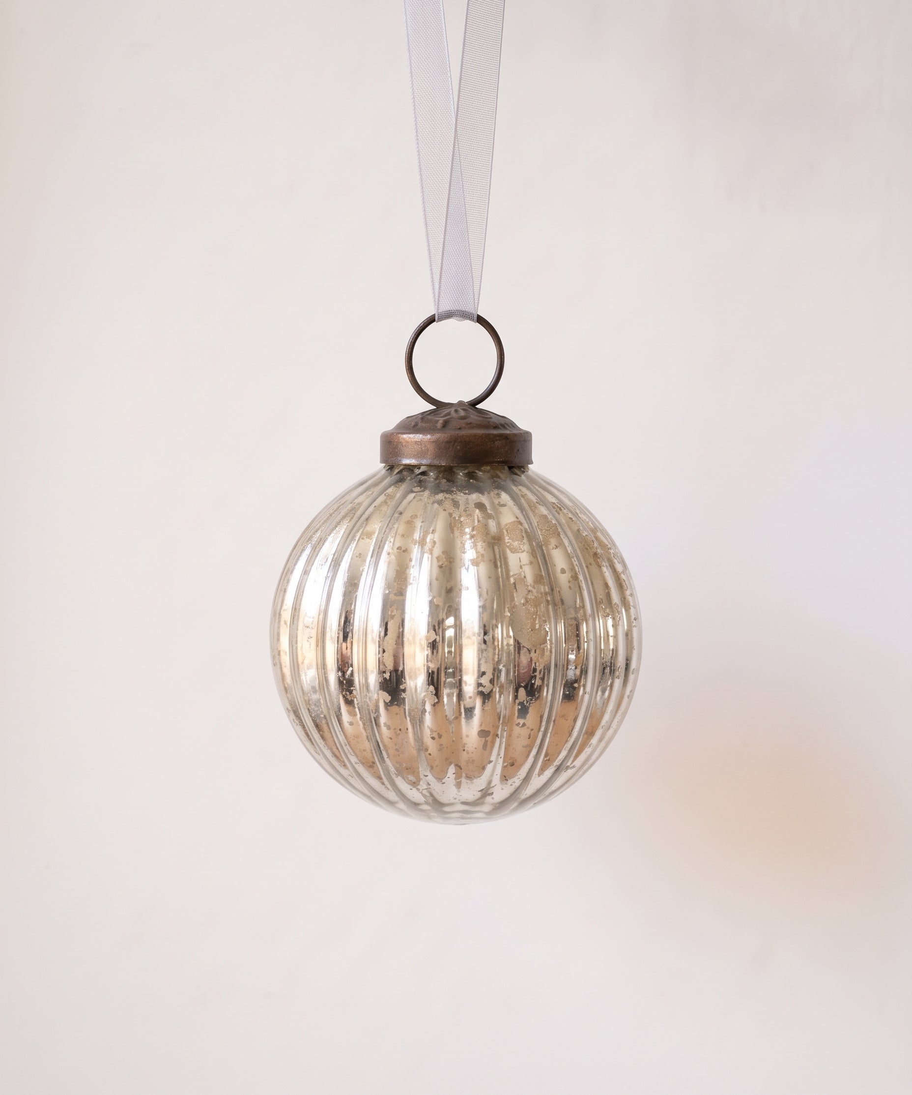 2 inch silver ribbed glass Christmas bauble with a bronze cap and ribbon hanger, made in India