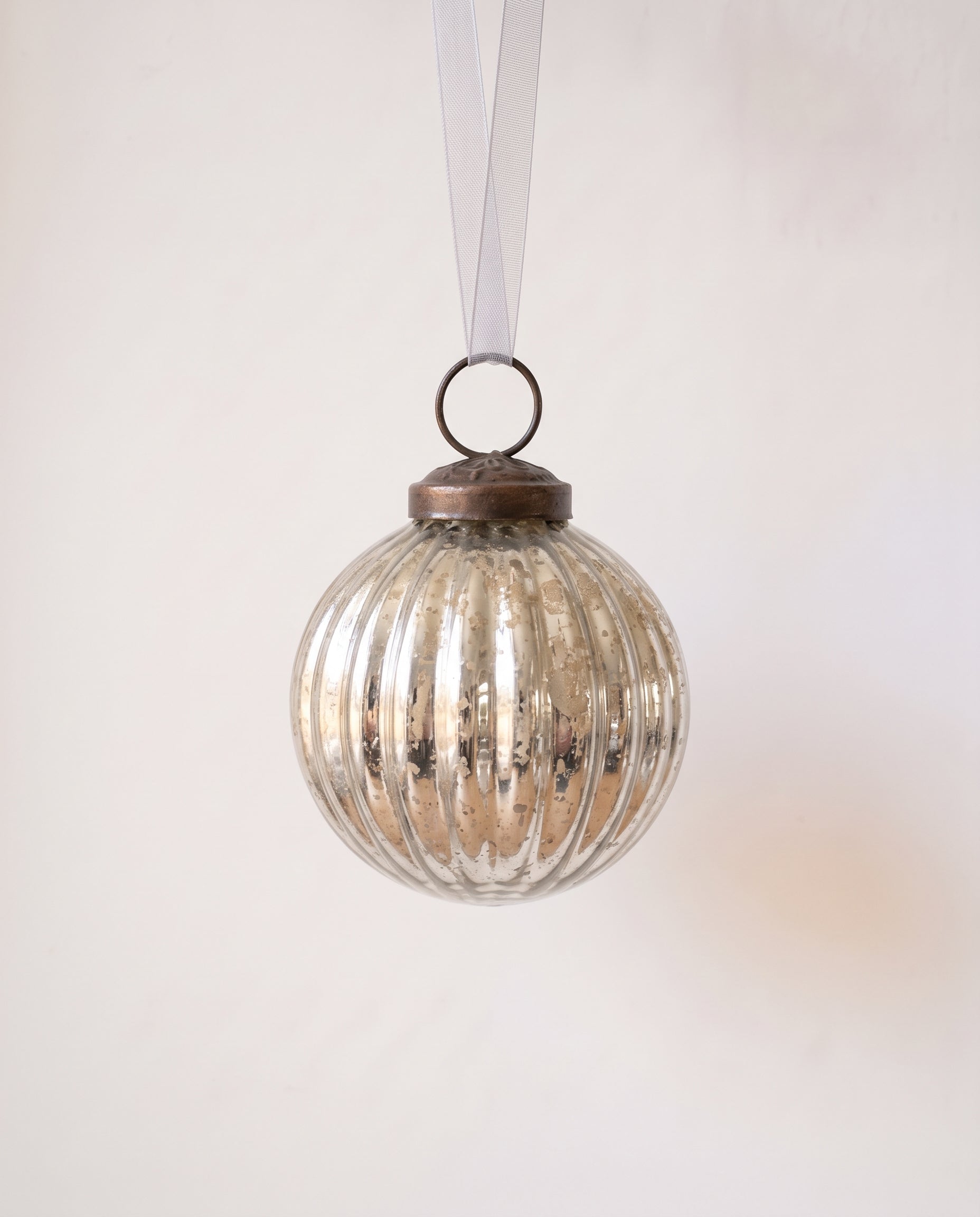 2 inch silver ribbed glass Christmas bauble with a bronze cap and ribbon hanger, made in India
