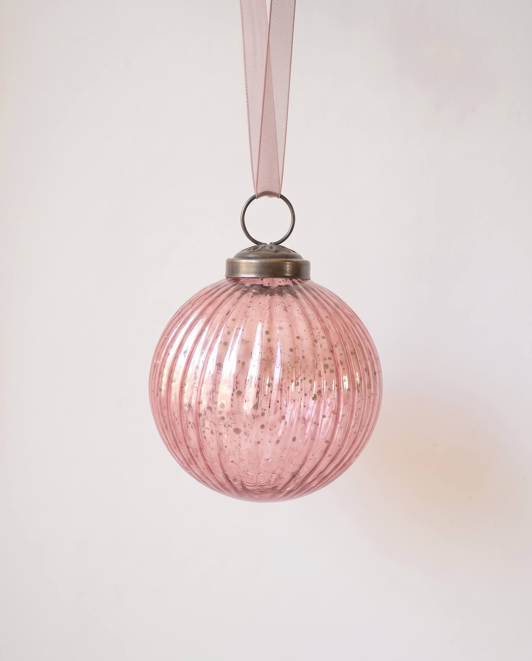 3 inch mauve ribbed glass Christmas bauble with a bronze cap and ribbon hanger, made in India