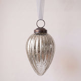 3 inch silver pressed glass pinecone ornament with a bronze cap and ribbon hanger, made in India
