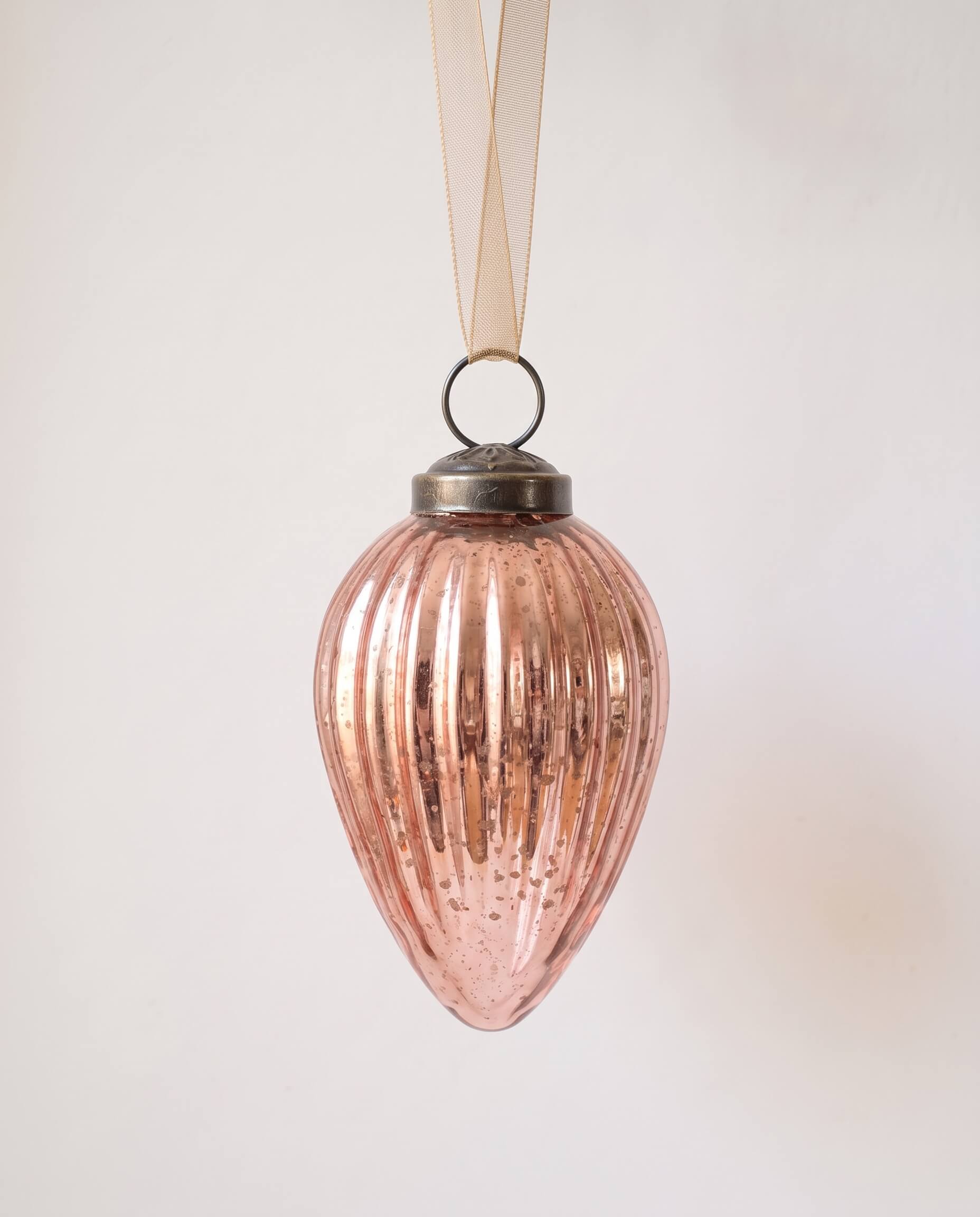 3 inch rose pressed glass pinecone ornament with a bronze cap and ribbon hanger, made in India