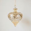 Hand-blown amber glass droplet ornament brushed with gold accents, made in Old Cairo, Egypt