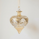 Hand-blown amber glass droplet ornament brushed with gold accents, made in Old Cairo, Egypt