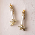 Mouth-blown glass candle ornament on a gold clip base that fastens to a branch, by Inge-Glas of Germany