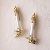 Mouth-blown glass candle ornament on a gold clip base that fastens to a branch, by Inge-Glas of Germany