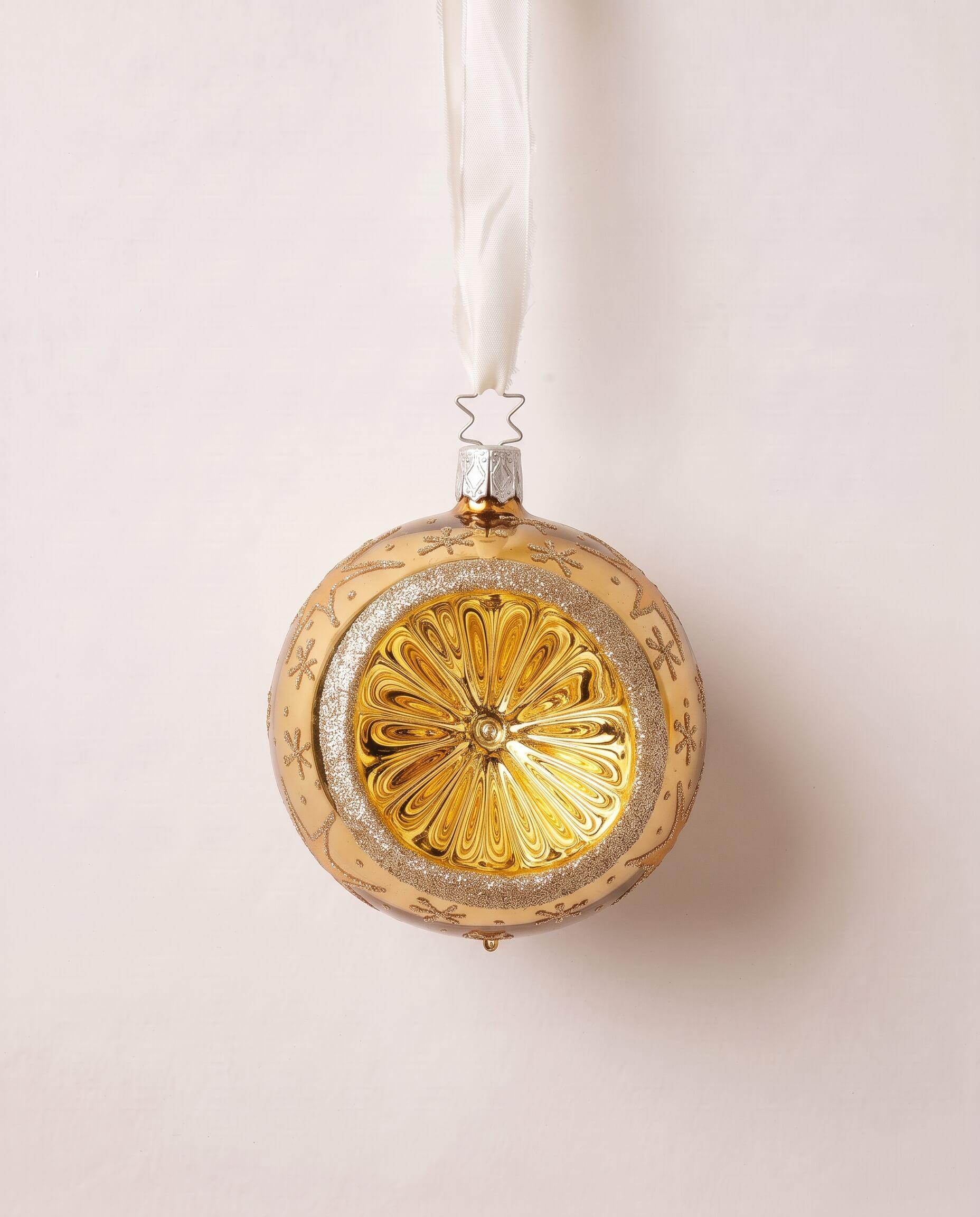 Gold mouth-blown glass ball ornament scattered with glittered stars, by Inge-Glas of Lauscha, Germany