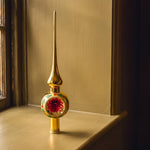 Gold mouth-blown glass Christmas tree topper with hand-painted twinkles and glitter, by Inge-Glas of Lauscha, Germany