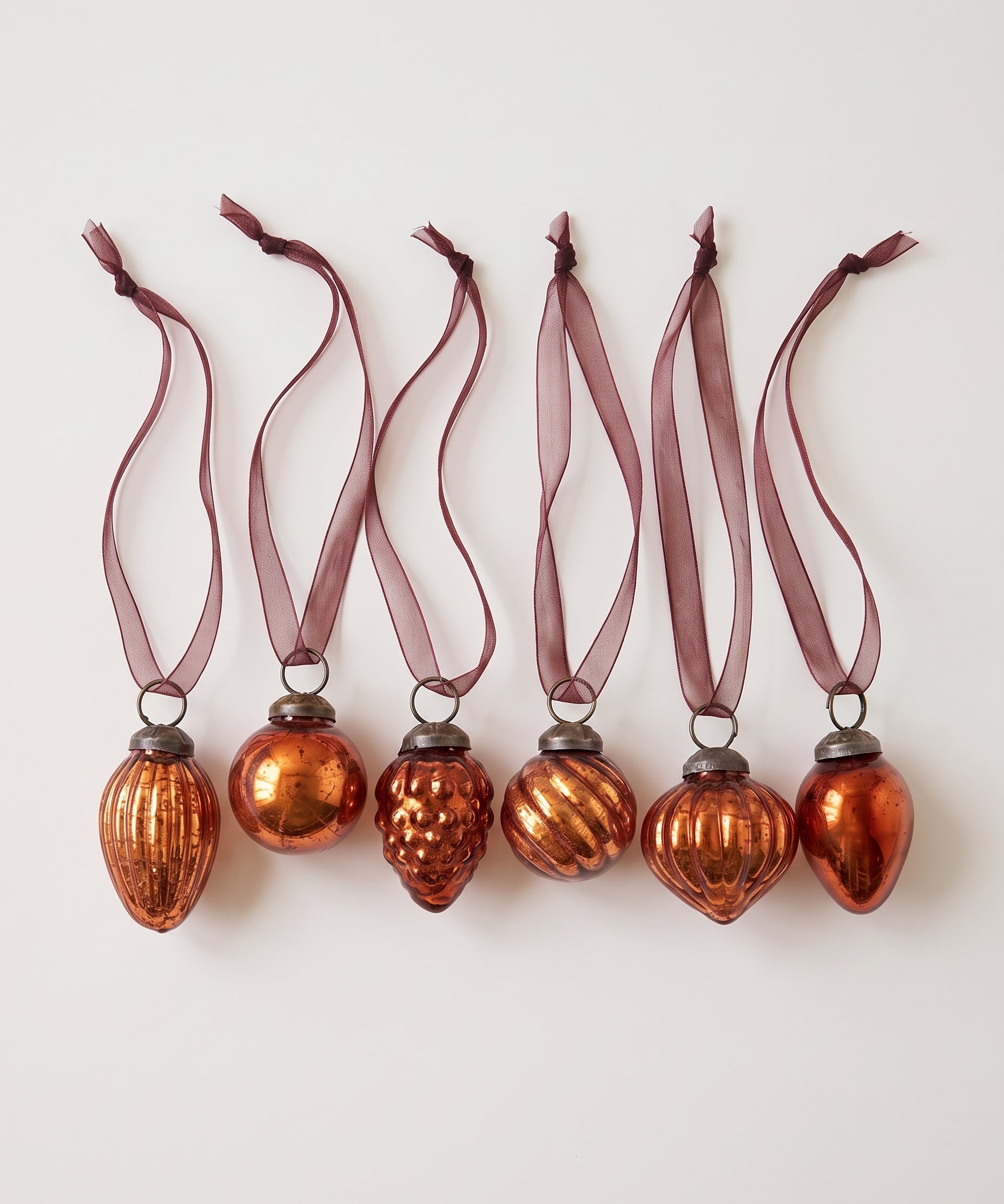 Set of six copper crackle glass Christmas baubles with bronze caps and ribbon hangers, made in India