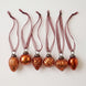 Set of six copper crackle glass Christmas baubles with bronze caps and ribbon hangers, made in India