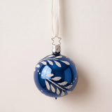 Midnight blue mouth-blown glass ornament with hand-painted gold and silver leaves, by Inge-Glas of Germany
