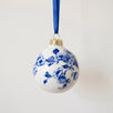 Blue and white Delft porcelain Christmas ball hand-painted with traditional florals, made in Delft, Netherlands