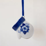 Delft blue hand-painted porcelain mitten ornament on a blue satin ribbon, made in Delft, Netherlands