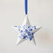 Porcelain star ornament hand-painted with a Delft blue floral motif, made in Delft, Netherlands