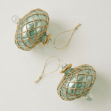 Hand-blown emerald green glass saucer ornament with a gold diamond harlequin pattern, made in Old Cairo, Egypt