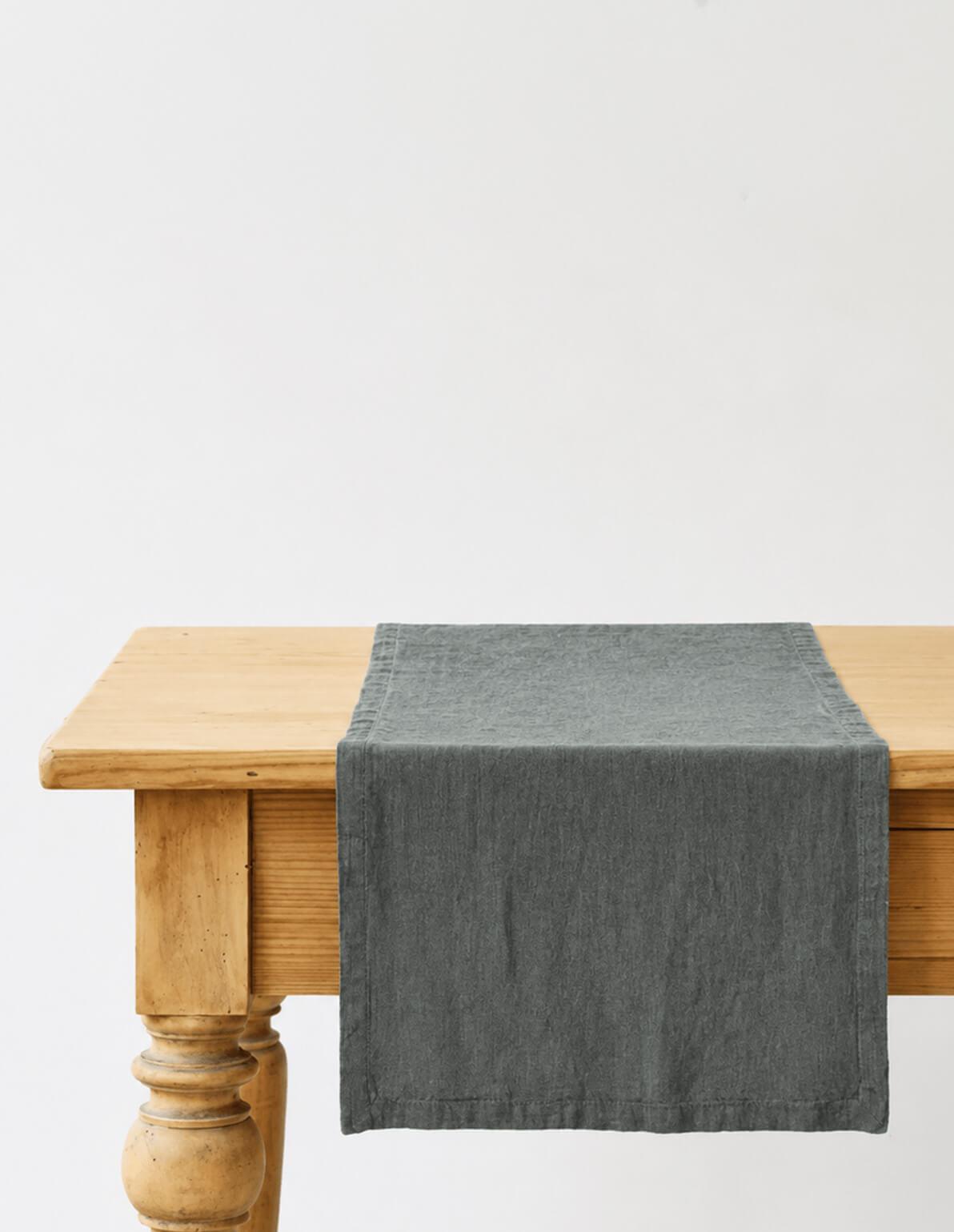 Forest green stone-washed linen table runner, woven in Lithuania from European flax