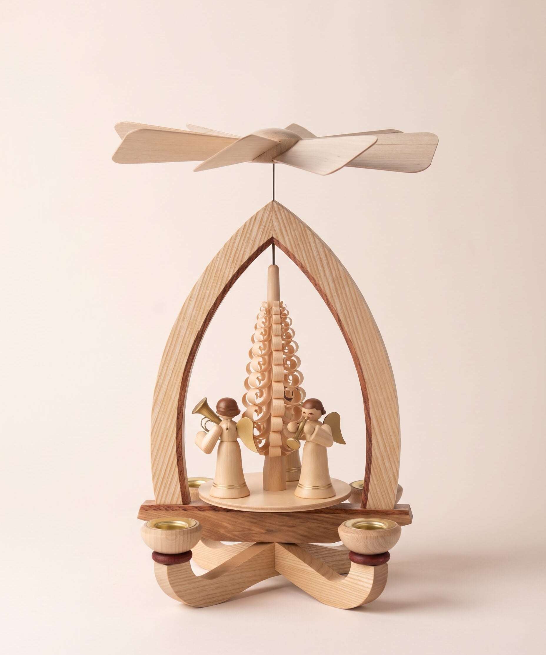 Hand-carved lime wood candle pyramid with trumpeting angels and gold detail, another view
