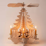 Hand-painted wooden candle pyramid with carol singers around a wood chip curl tree, made in Seiffen, Germany
