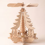 Hand-carved lime wood candle pyramid with deer and evergreens in a forest scene, another view