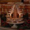 Hand-carved lime wood candle pyramid with deer and evergreens in a forest scene, made in Seiffen, Germany