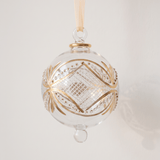 Hand-blown clear glass bauble circled with gold carousel bands, made in Old Cairo, Egypt