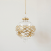 Hand-blown clear glass bauble painted with gold garland swags, made in Old Cairo, Egypt