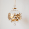 Hand-blown clear glass bauble painted with gold snowflakes, made in Old Cairo, Egypt
