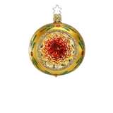 Silvered glass reflector ornament with a red, green and gold painted centre and gold glitter rim, another view