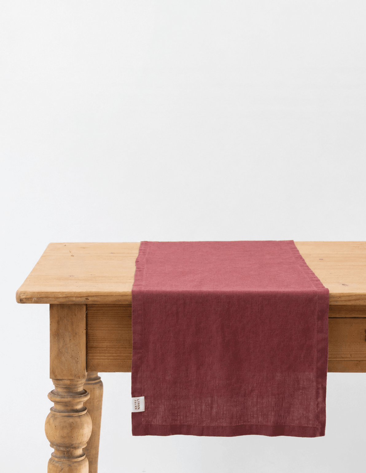 Marsala red stone-washed linen table runner, woven in Lithuania from European flax