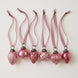 Set of six mauve crackle glass Christmas baubles with bronze caps and ribbon hangers, made in India