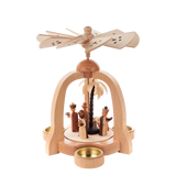 Hand-carved wooden candle pyramid with nativity scene, made in Seiffen, Germany.