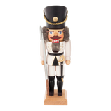 Hand-carved wooden nutcracker soldier in classic German uniform, Seiffen craftsmanship.