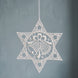 White Plauen lace star ornament with a bell design at the centre, made in Plauen, Germany