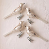 Set of four white mouth-blown glass bird ornaments with glitter detail, made in Thuringia, Germany