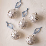 White mouth-blown German glass bauble with hand-applied glitter, made in Thuringia, Germany