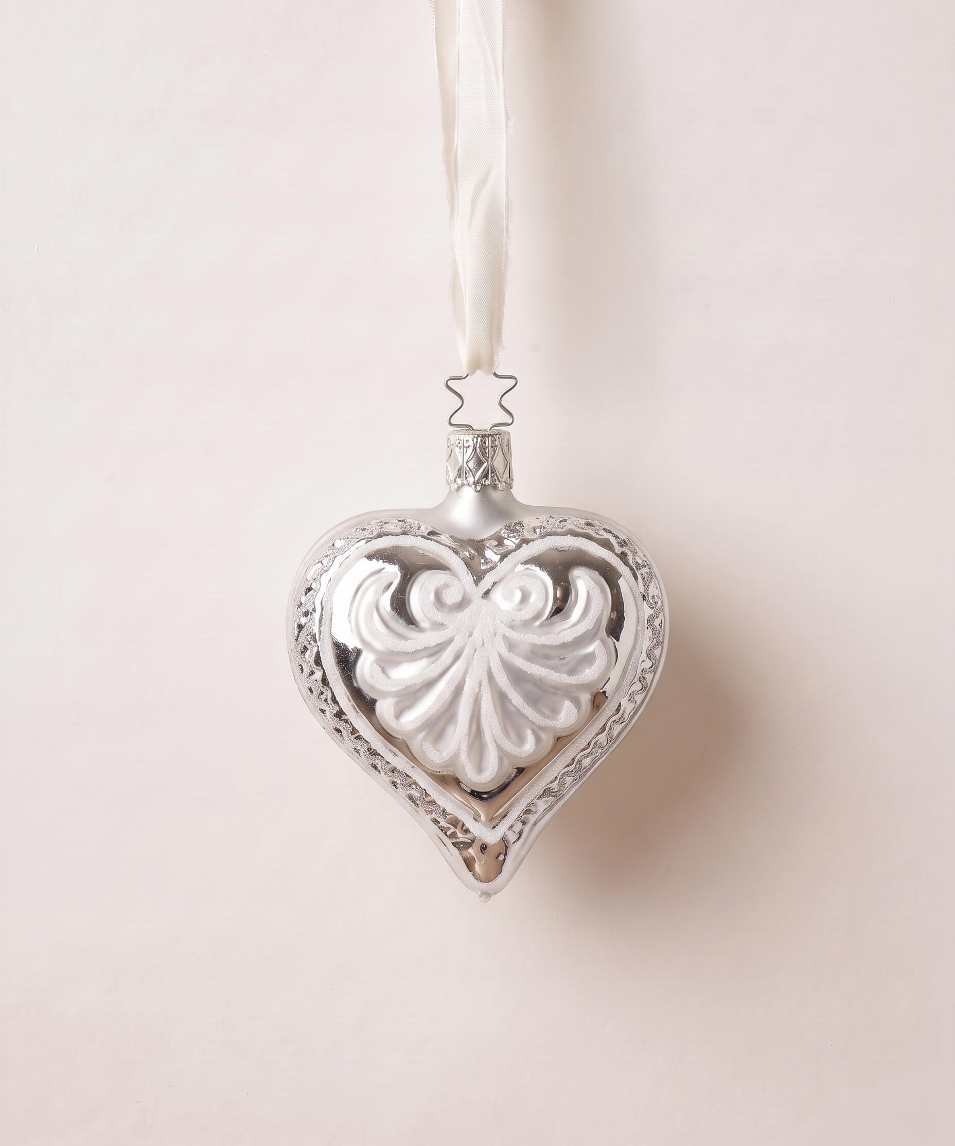 Sterling silver mouth-blown glass heart ornament with glittered edges, by Inge-Glas of Lauscha, Germany