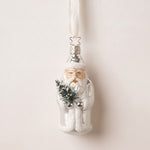 Silver and white mouth-blown glass St. Nicholas ornament holding a small evergreen, by Inge-Glas of Germany