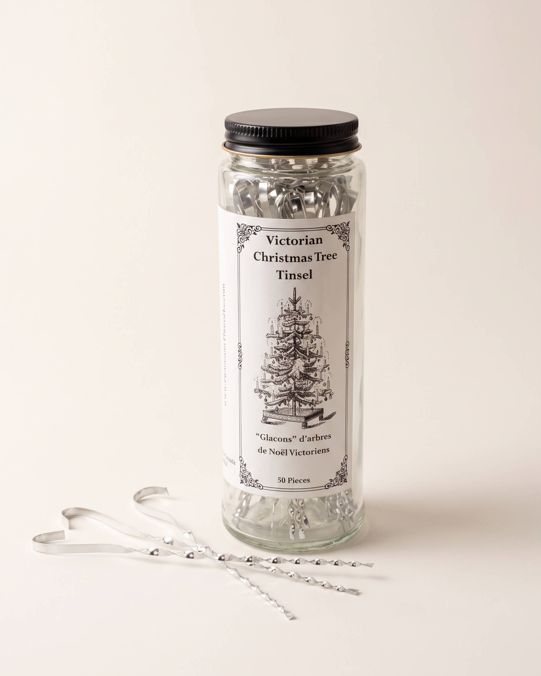 Silver Victorian-style Christmas tree tinsel in twisted tin-plated steel, made in Lancaster, Ontario