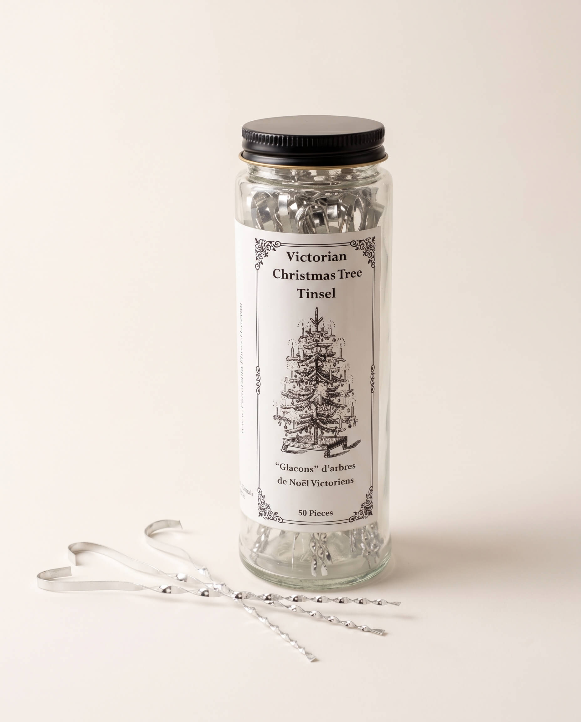 Silver Victorian-style Christmas tree tinsel in twisted tin-plated steel, made in Lancaster, Ontario