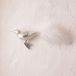 Matte off-white mouth-blown glass songbird ornament with a clip base, another view
