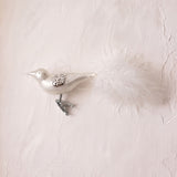 Matte off-white mouth-blown glass songbird ornament with a clip base, another view