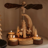 Hand-painted wooden candle pyramid with three children at play among trees, made in Seiffen, Germany